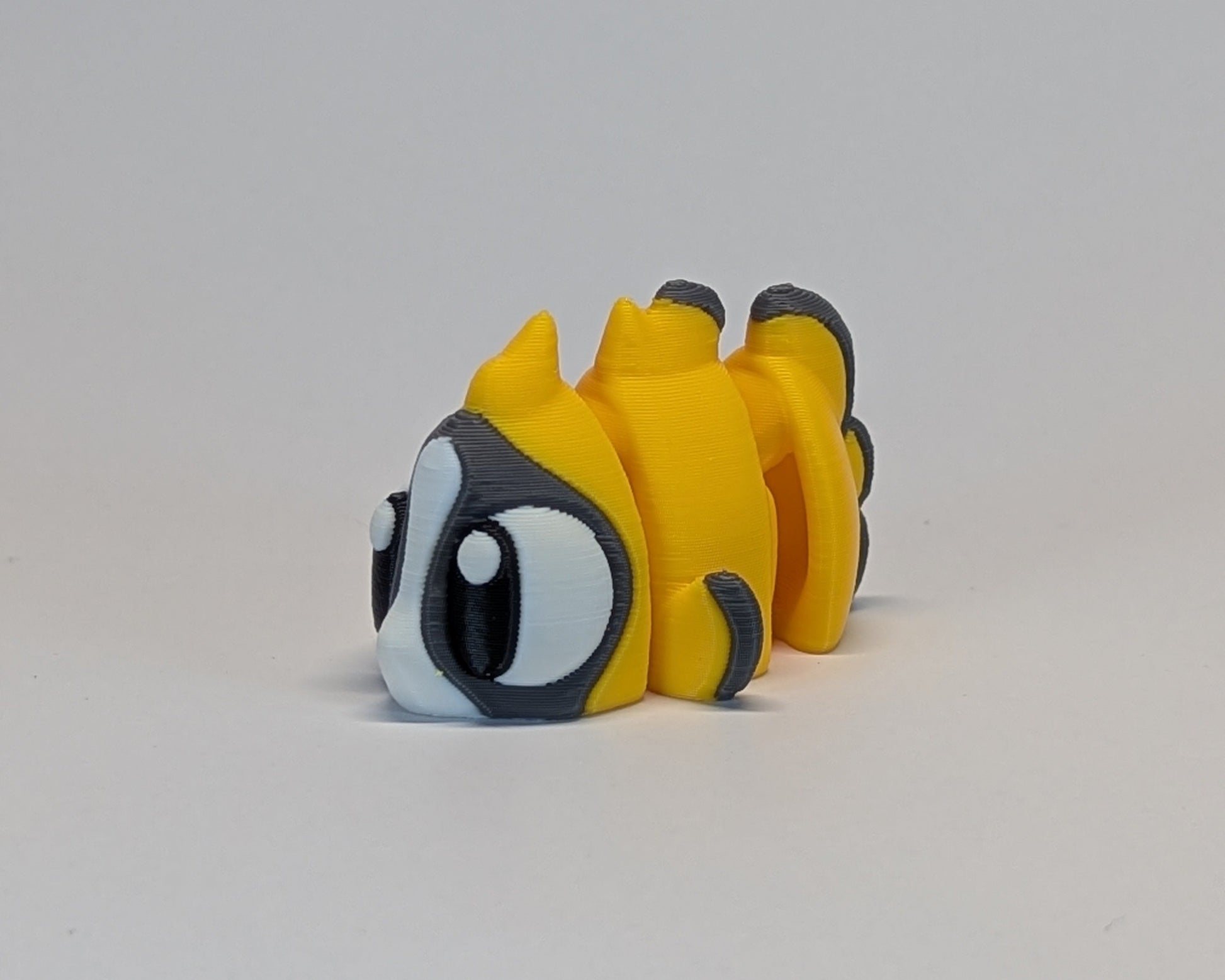 Butterfly Fish Cute Critter facing forward left