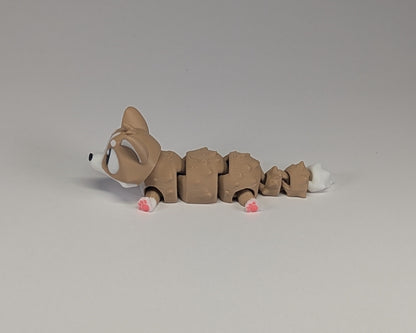 Corgi Cute Critter laying down side View With Paws