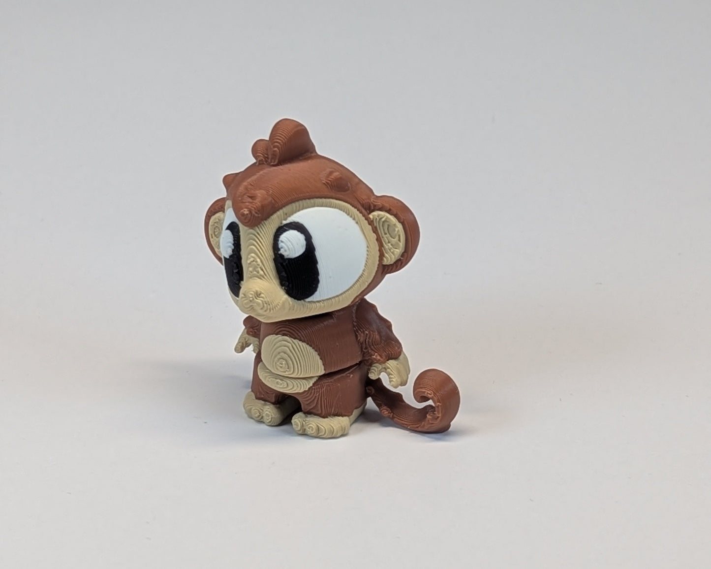 Single Cute Critter Monkey Standing Facing Right with Curly Tail