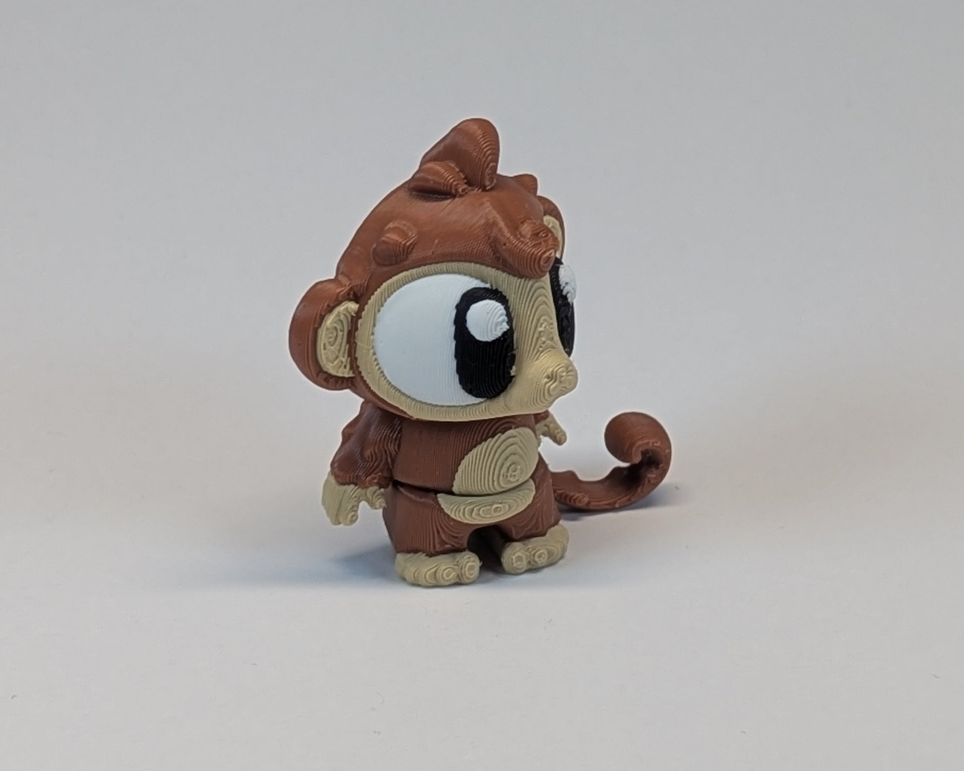 Single Cute Critter Monkey Standing Looking Right
