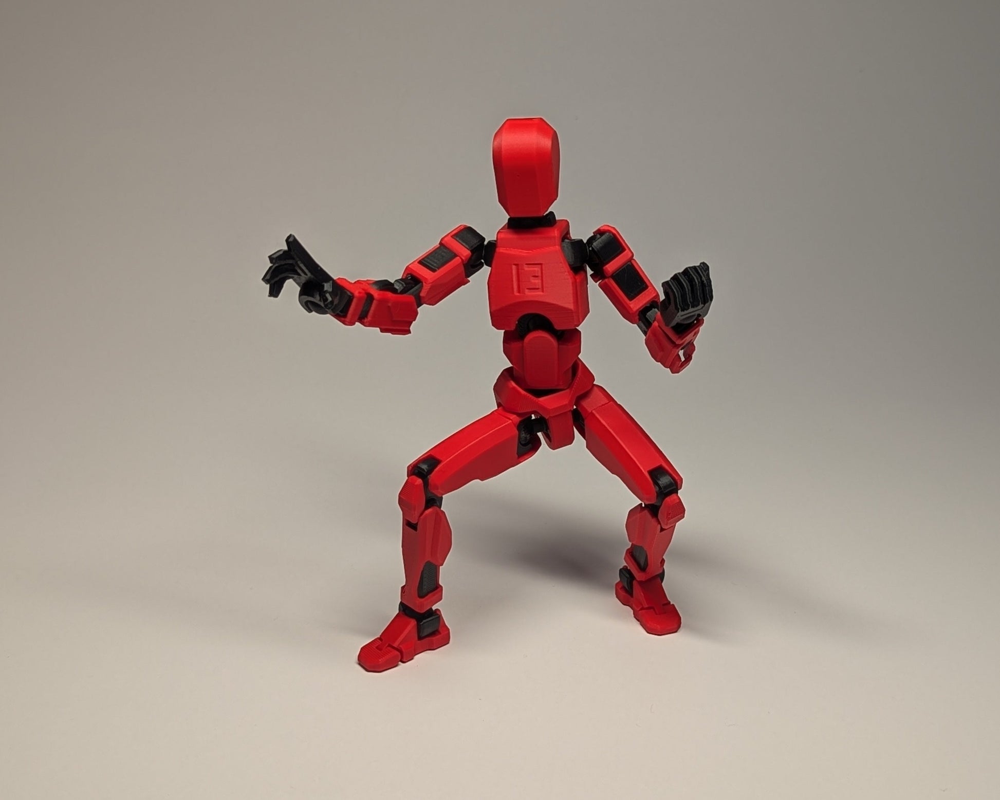 Dummy 13 action figure on a gray background