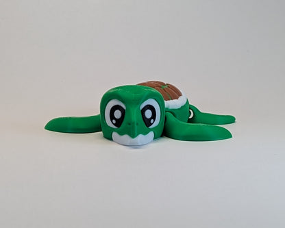 Green plush turtle toy on a light gray background