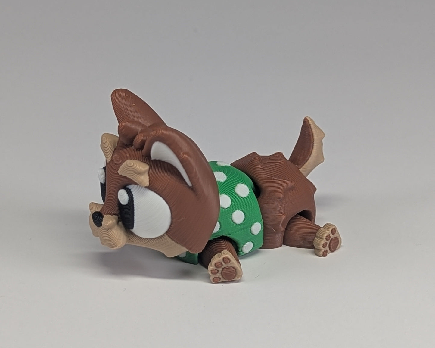Yorkshire Terrier laying down side view