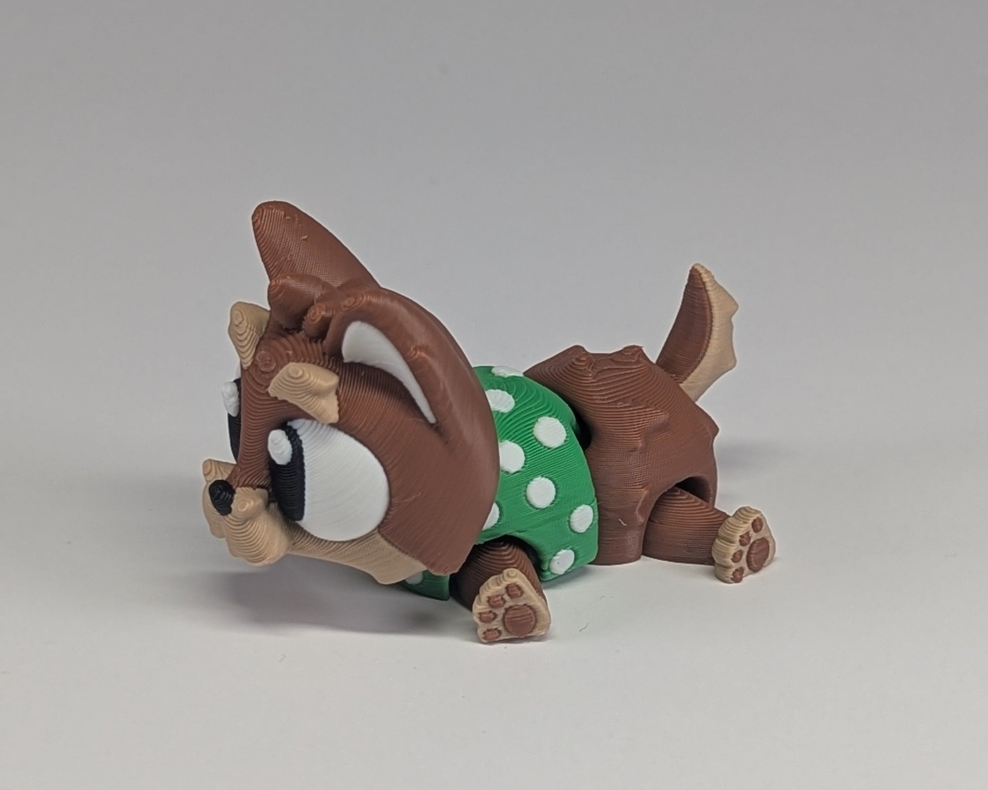 Yorkshire Terrier laying down side view