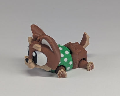 Yorkshire Terrier laying down side view